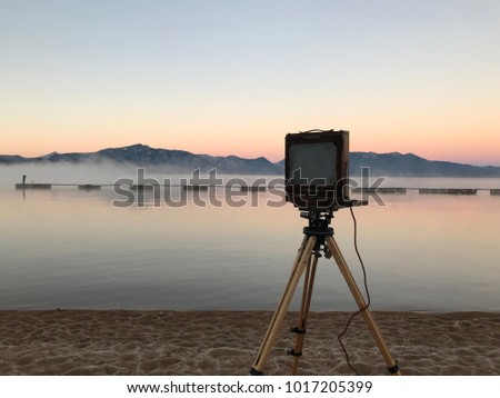 Large format wooden view camera in the field