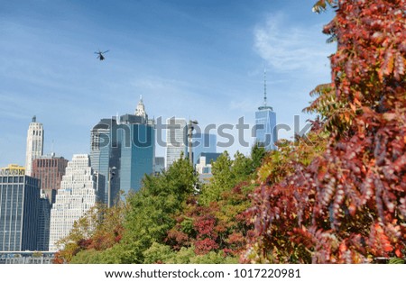 Manhattan skyline view from Brooklyn Bridge Park in autumn, New York City.