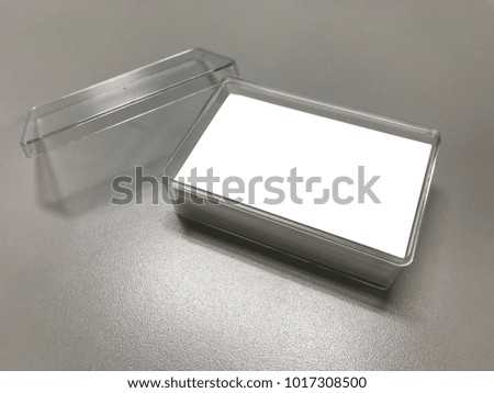 White blank business card on dark gray background