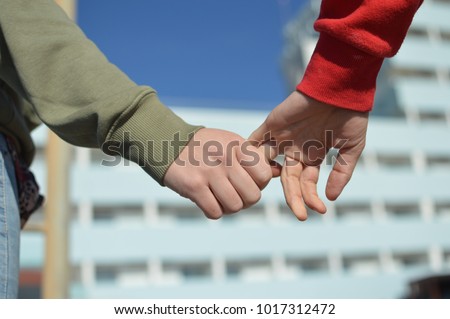 Touching human hands of cheerful people on sunshine beautiful nature outdoors. Lovely valentine harmony, symbolic friendship help. Closeup lifestyle support, dreams holiday freedom travel vacation