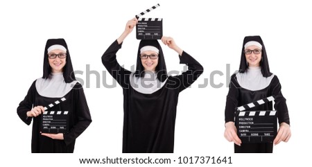 Young nun with clapperboard isolated on white