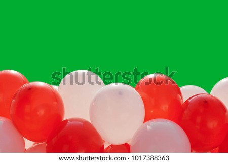Balloons on green background