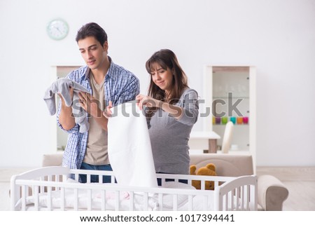 Young parents expecting their first baby