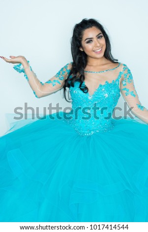 Teen Woman Posing In a Fancy Dress