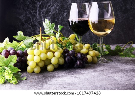 Wine glass and Bottle on table. Red and white wine