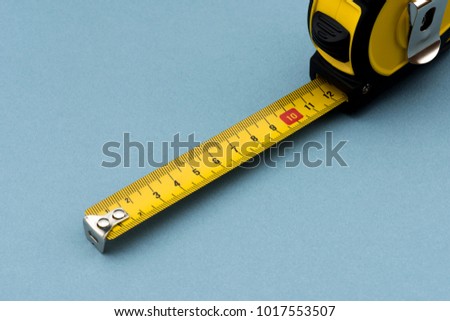 Yellow Measuring Tape Royalty-Free Stock Photo #1017553507