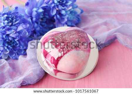 Pink cake heart with flowers
