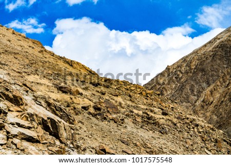 Sharp and rocky barren brown mountains of Ladakh, Jammu and Kashmir, India.