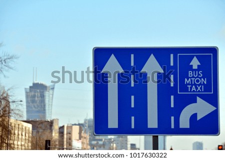 Blue freeway sign over the road
