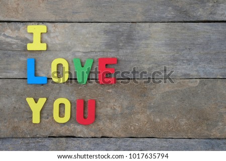 word I LOVE YOU  on wood colorful.