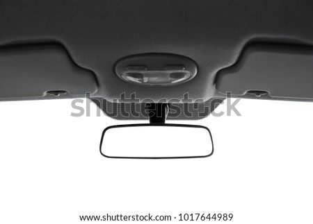 Modern rear view mirror and part of car ceiling on white background Royalty-Free Stock Photo #1017644989