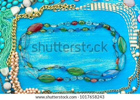 Decorative frame of women's jewelry. Top view Flat lay