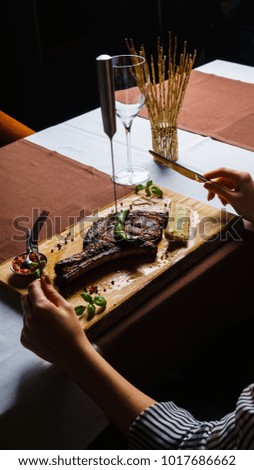 Steak Cowboy on a plate in restaurant