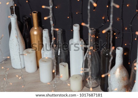 New Year decor with decorative bottles