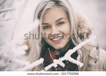 Beautiful young girl outdoors in the snow wearing hood - Stock image
Winter, Women, Girls, Child, People