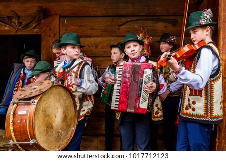 Uzhgorod, Ukraine - January 13, 2018: Children's folklore collective performs during the eighth ethnic festival Christmas Carols in the old village. 