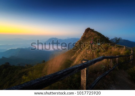 Morning mist and mountains. Mountain View.High angle view at Doi Phu Chi Dao Scenic spot inWiang Kaen District, Chiang Rai,Thailand.