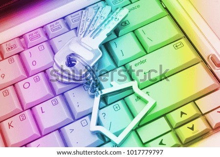 Keys on computer keyboard, real estate theme