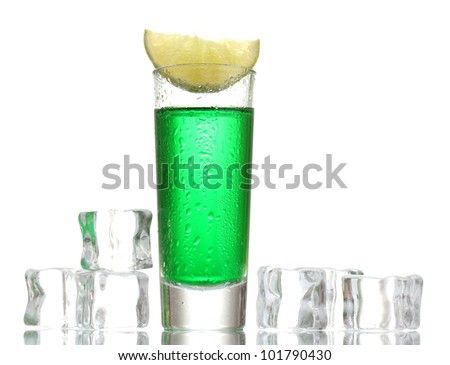 glass of absinthe, ice and lime isolated on white