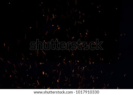 The flames of darkness float in the air.Fire charcoal. Royalty-Free Stock Photo #1017910330