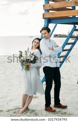 Beautiful couple in love on the beach