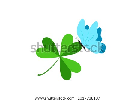 
A blue butterfly on a three-leafed clover. Day of holy celebration. Design of a flat icon. 