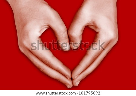 Heart made of child hands