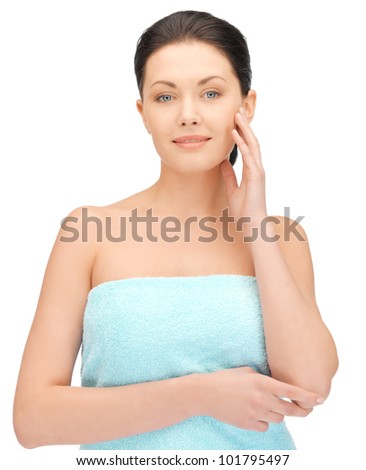 closeup portrait picture of beautiful woman in towel