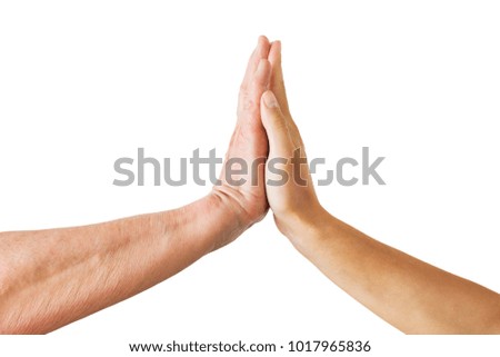 people, age and body parts concept - close up of senior and young woman touching hands