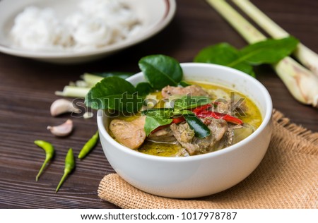 Green curry (Kaeng kheiyw hwan) with Thai food for steamed rice or rice noodles. Thai food very popular Royalty-Free Stock Photo #1017978787