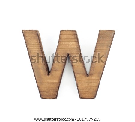 Single sawn wooden letter W symbol coated with paint isolated over the white background