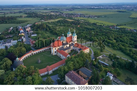 Aerial view on Pilgrimage Church of the Visitation of the Virgin Mary - pilgrimage site of European significance "The Holy Hill" from-afar visible silhouette of basilica minor over moravian landscape.