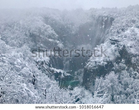 Landscape picture of Plitvice waterfalls and National Park, Croatia in the snow