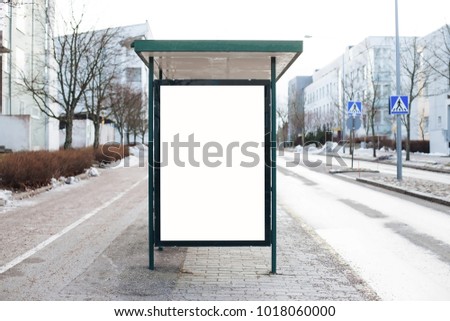 Mock up of light box on the bus stop. City bus stop with empty mock up banner for your advertising