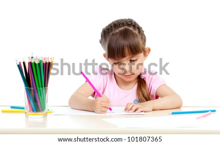cute girl drawing with colourful pencils