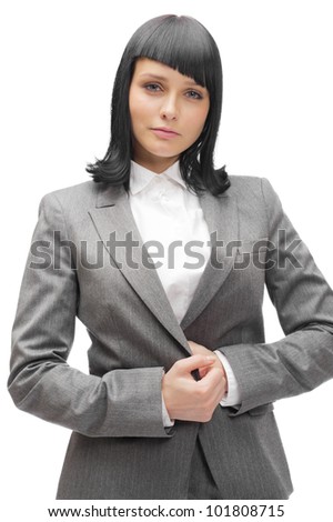 Portrait of a happy young business woman standing against white background