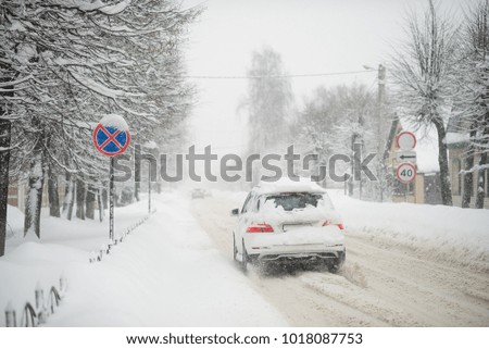 Snowfall in the street.
