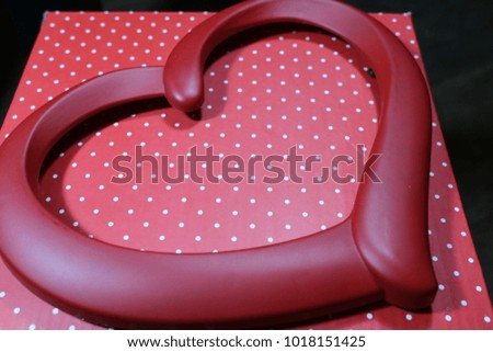romantic heart decoration and white paper with white dots for Valentine's Day