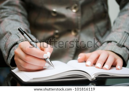 Female hand writing