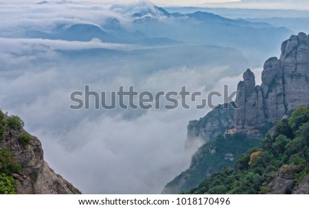 Montserrat hill between clouds near Barcelona in Spain