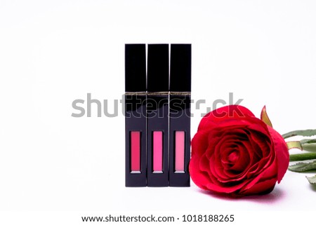 Flowers rose, lipstick brush uses lips for women,Flat lay fashion with lipsticks,Set of lipstick  Red, pink, wine ,essential beauty item isolated on white background