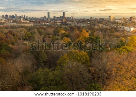 A sunny, colorful autumn view of Boston right before the leaves fall off the trees for the winter.