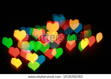 Colorful mini heart broken Light. Valentine Background. Love Background. Bokeh Light Background. Blurred photo. 