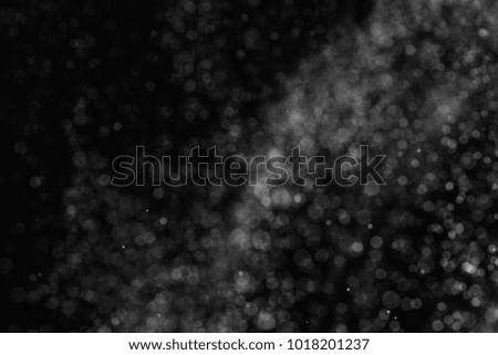 abstract white powder explosion on black background   