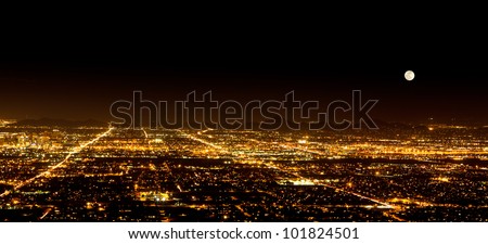 The Super Full Moon on May 5, 2012 over the city light of Phoenix Arizona. Photograph was taken from the top of South Mountain. Royalty-Free Stock Photo #101824501