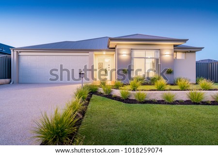 Front elevation / facade of a new modern Australian style home. Royalty-Free Stock Photo #1018259074