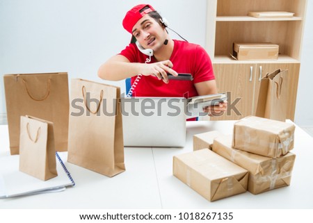 Call center worker at parcel distribution center in post office