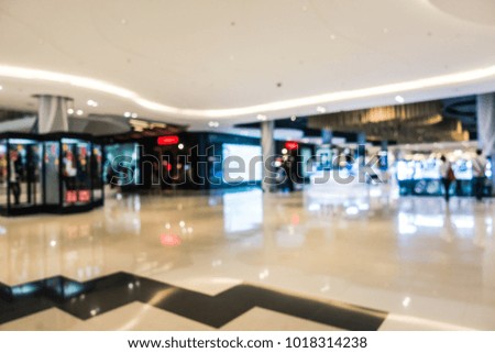 Abstract blur defocused shopping mall of department store interior for background
