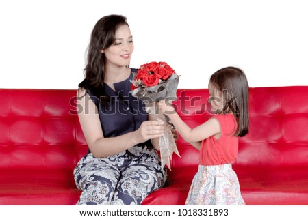 Image of cute little girl giving a bouquet flower for her mother, isolated on white background