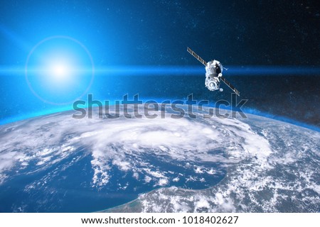 Blue planet Earth. Spacecraft launch into space. Elements of this image furnished by NASA. Royalty-Free Stock Photo #1018402627